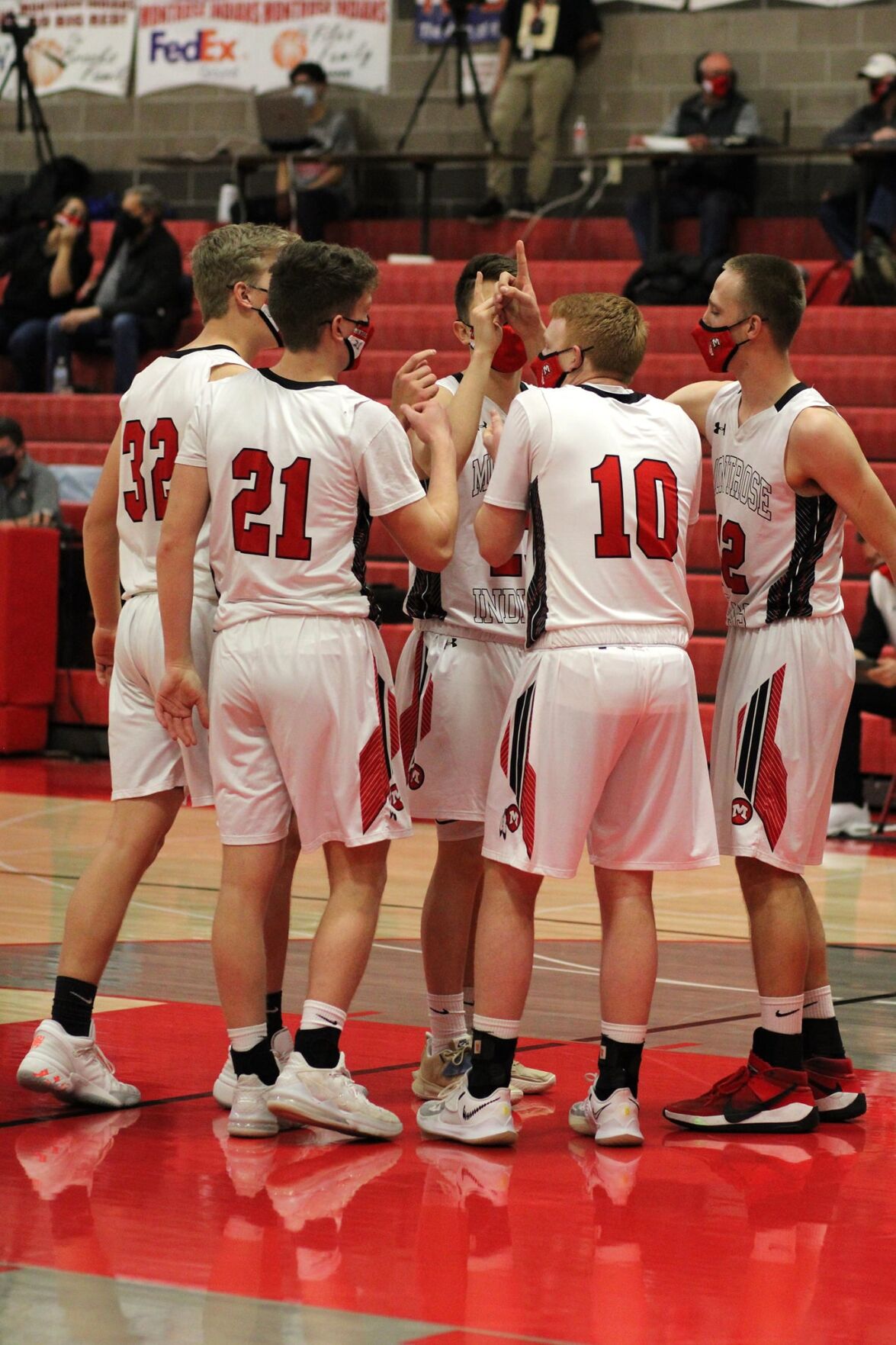 MHS boys basketball embrace
